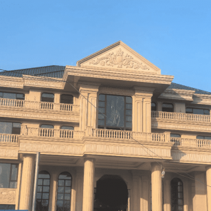 运城黄金麻别墅外墙干挂石材效果示例