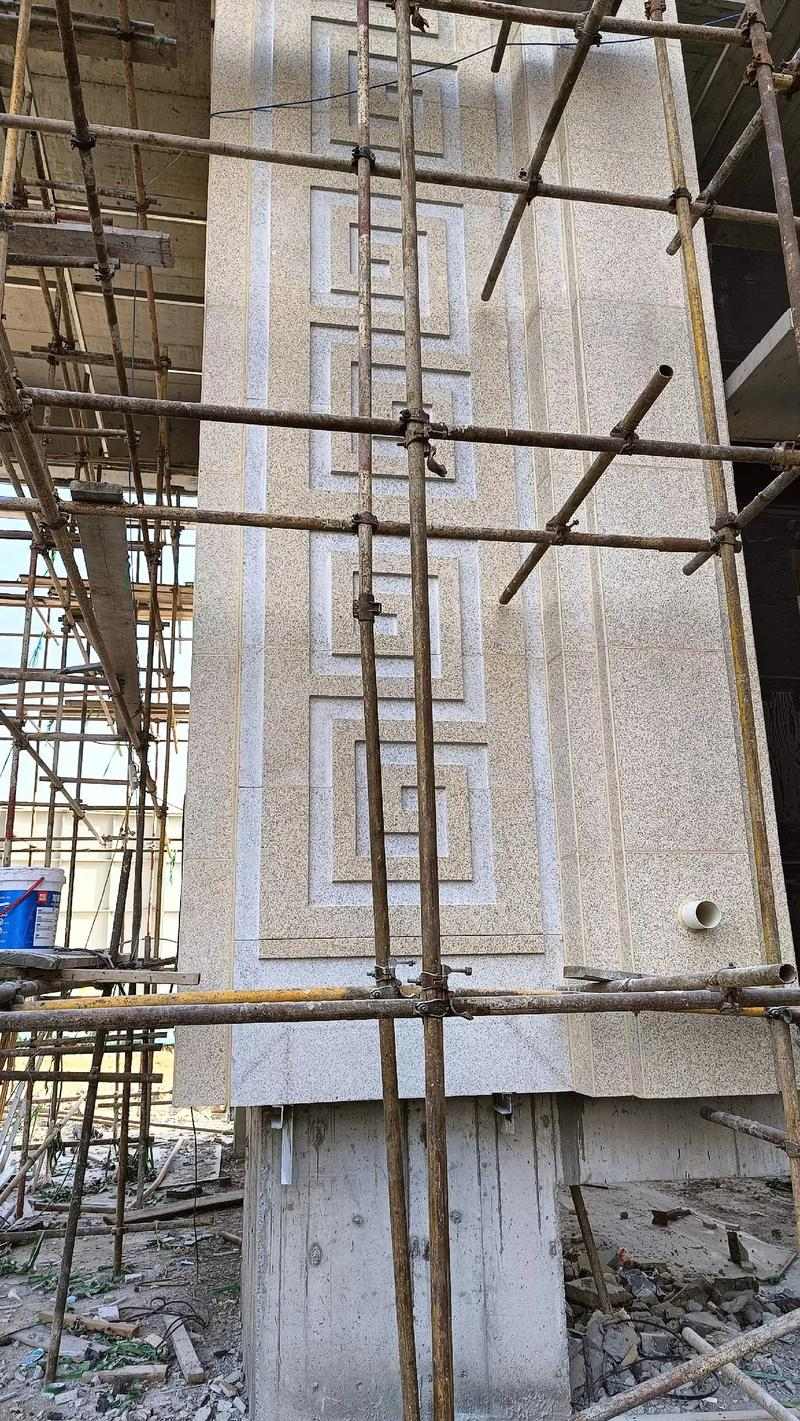 运城 黄金麻花岗岩别墅外墙干挂回纹造型效果