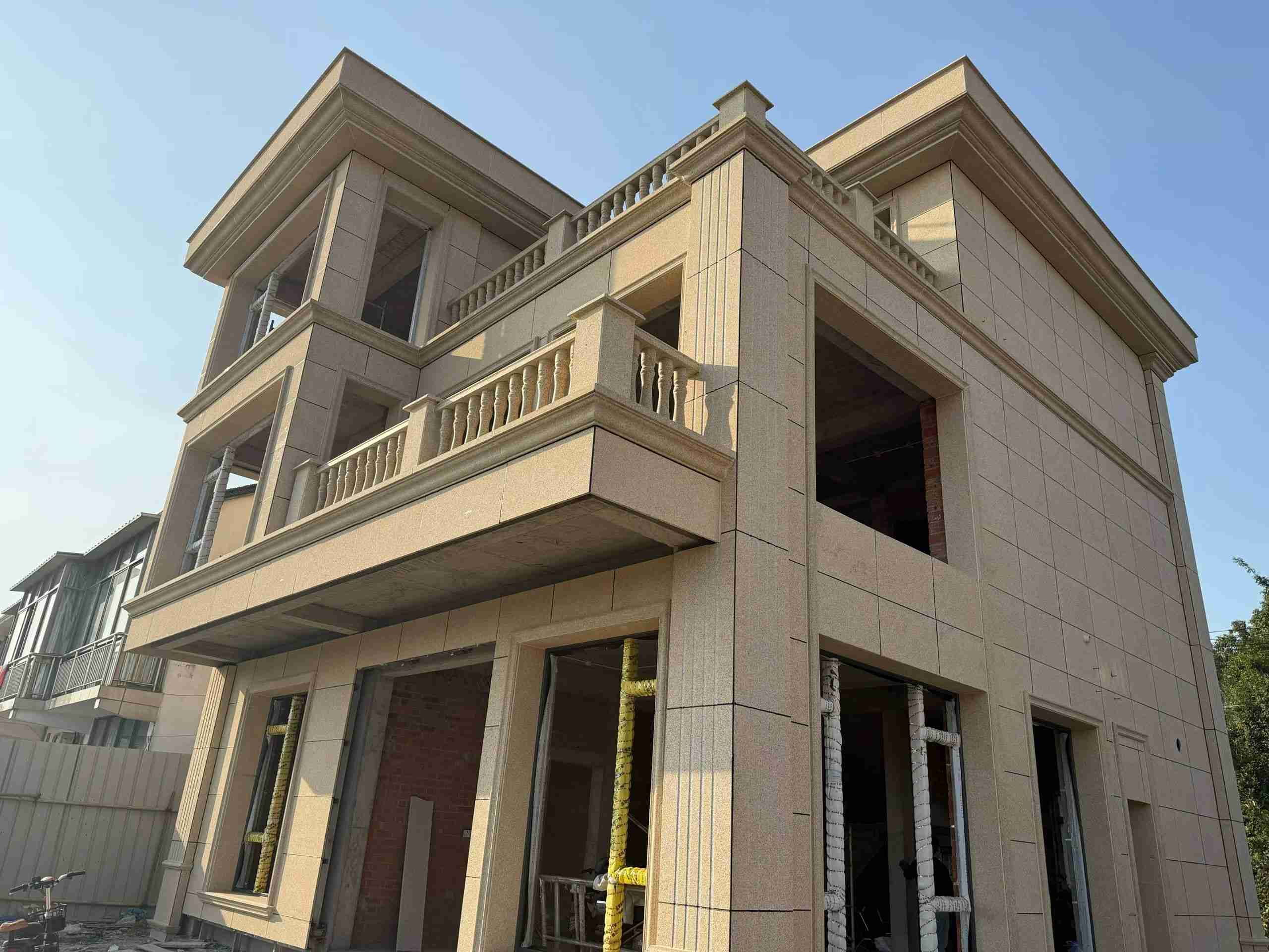 运城 黄金麻花岗岩石材荔枝面外墙干挂效果展示